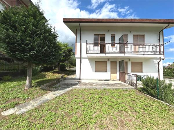 PORTION OF HOUSE WITH GARDEN